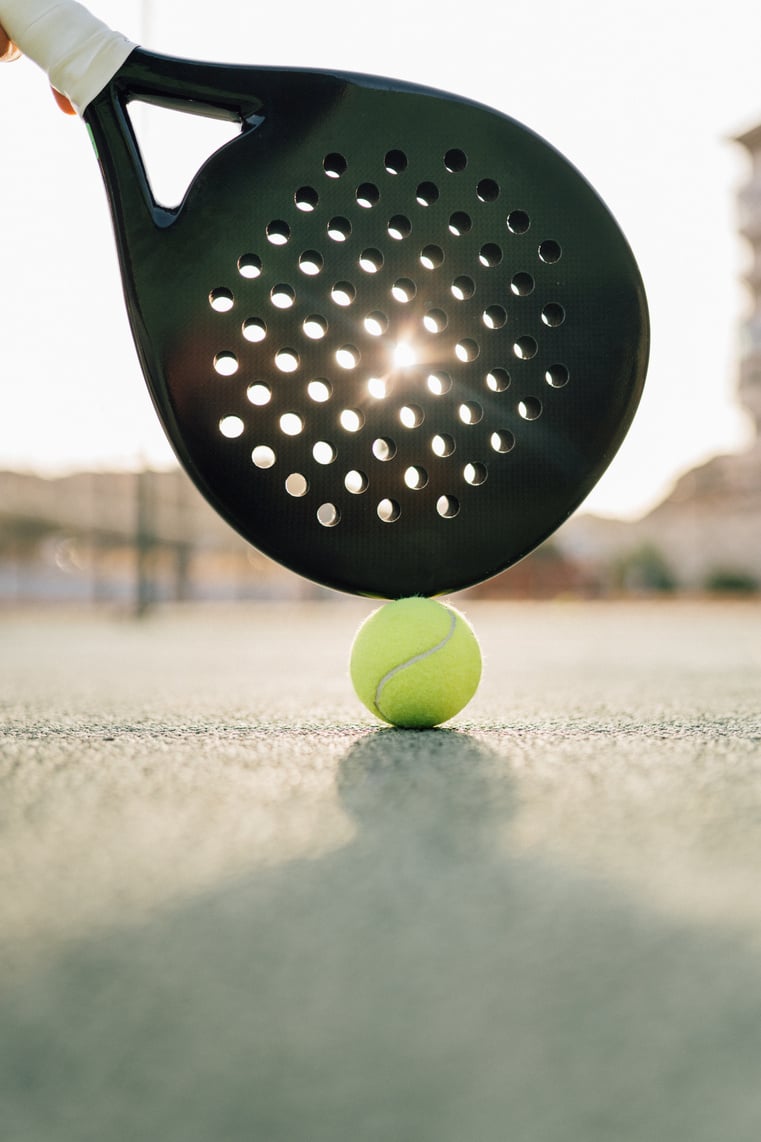 Paddle tennis racquet and ball